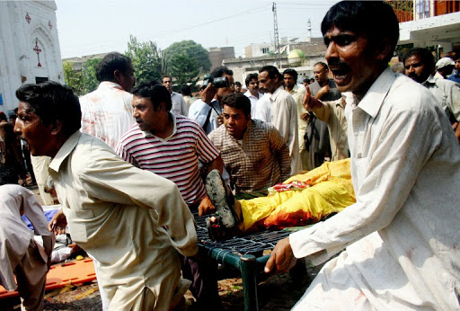 Suicide bombers murder 80 outside church in Pakistan