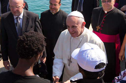 Pope Francis visits refugees at Jesuit center in Rome