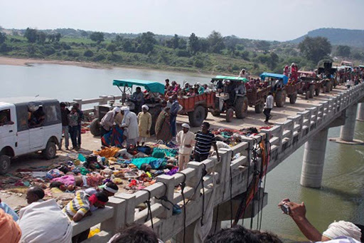 Hindu Festival Bridge Stampede Kills 117