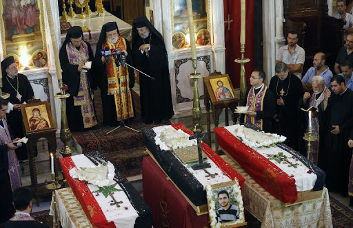 Funeral march for the three Christian Syrians who were killed