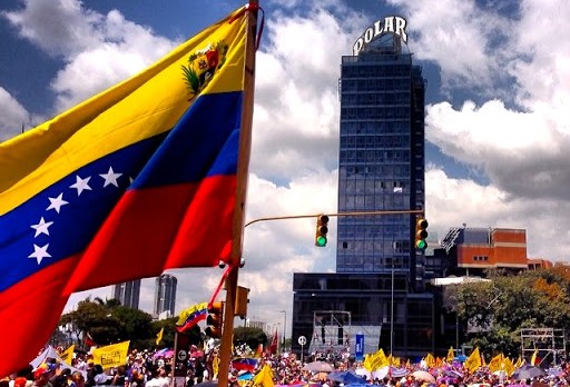 Venezuela’s Nicolás Maduro Expels US Diplomats, Brands Protest Leader as “The Face of Fascism”