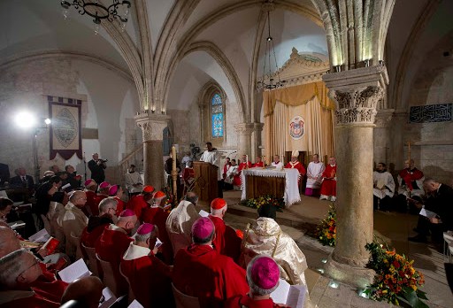 JERUSALEM : Clergymen attend a mass celebrated by Pope Francis (unseen) at the site known as the Cenacle, or Upper Room &#8211; en