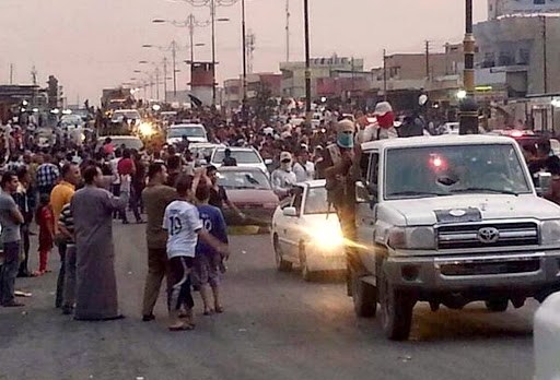 Militants drive thru Mosul