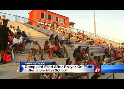 Controversy over praying football players