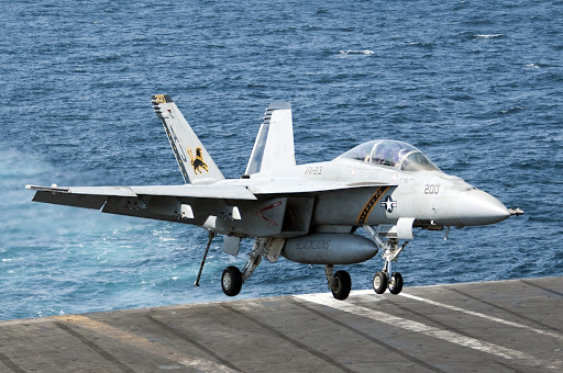 Navy fighter lands on George HW Bush after striking Syria