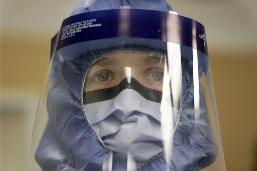Nurse with ebola protective gear