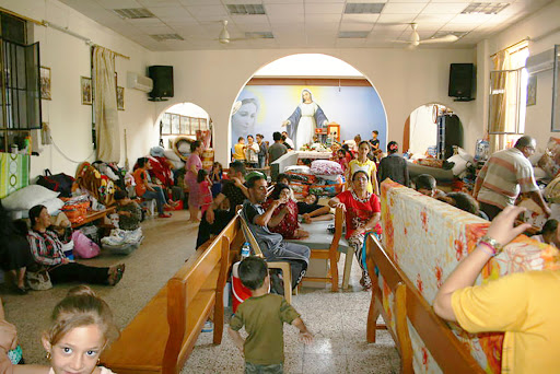 Iraqi Christian refugees living in church