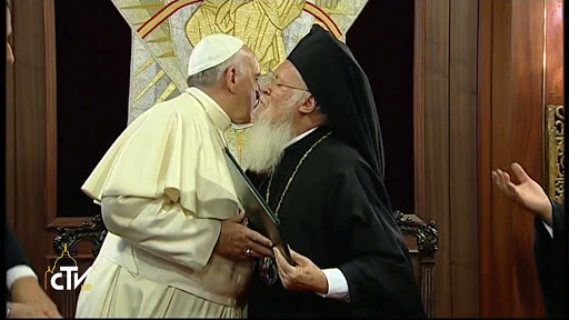 Pope Francis and Patriarch Bartholomew embrace