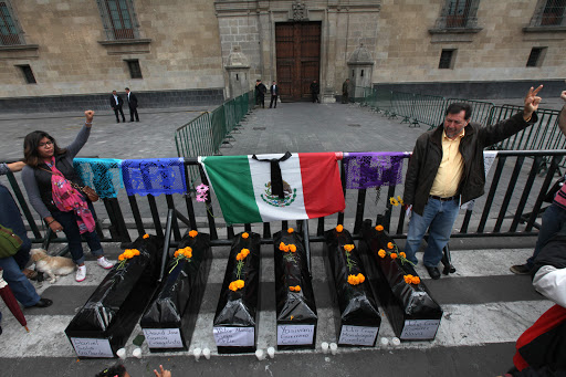 Protestors with mock coffins in Mexico City