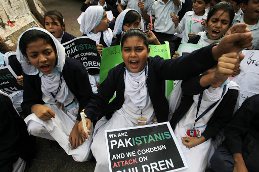Pakistani schoolgirls protest Taliban attack on school