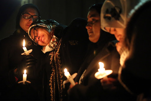 Mourners at vigil for three people killed near UNC-Chapel Hill