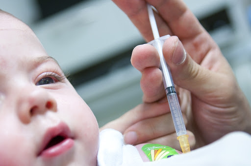 Baby being vaccinated