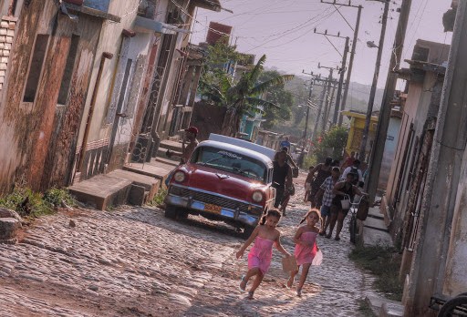 Girls playing in street in Cuba