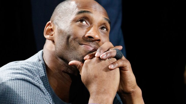 SAN ANTONIO,TX - FEBRUARY 6: Kobe Bryant #24 of the Los Angeles Lakers watches tribute at AT&amp;T Center on February 6, 2016 in San Antonio, Texas. NOTE TO USER: User expressly acknowledges and agrees that , by downloading and or using this photograph, User is consenting to the terms and conditions of the Getty Images License Agreement. (Photo by Ronald Cortes/Getty Images)