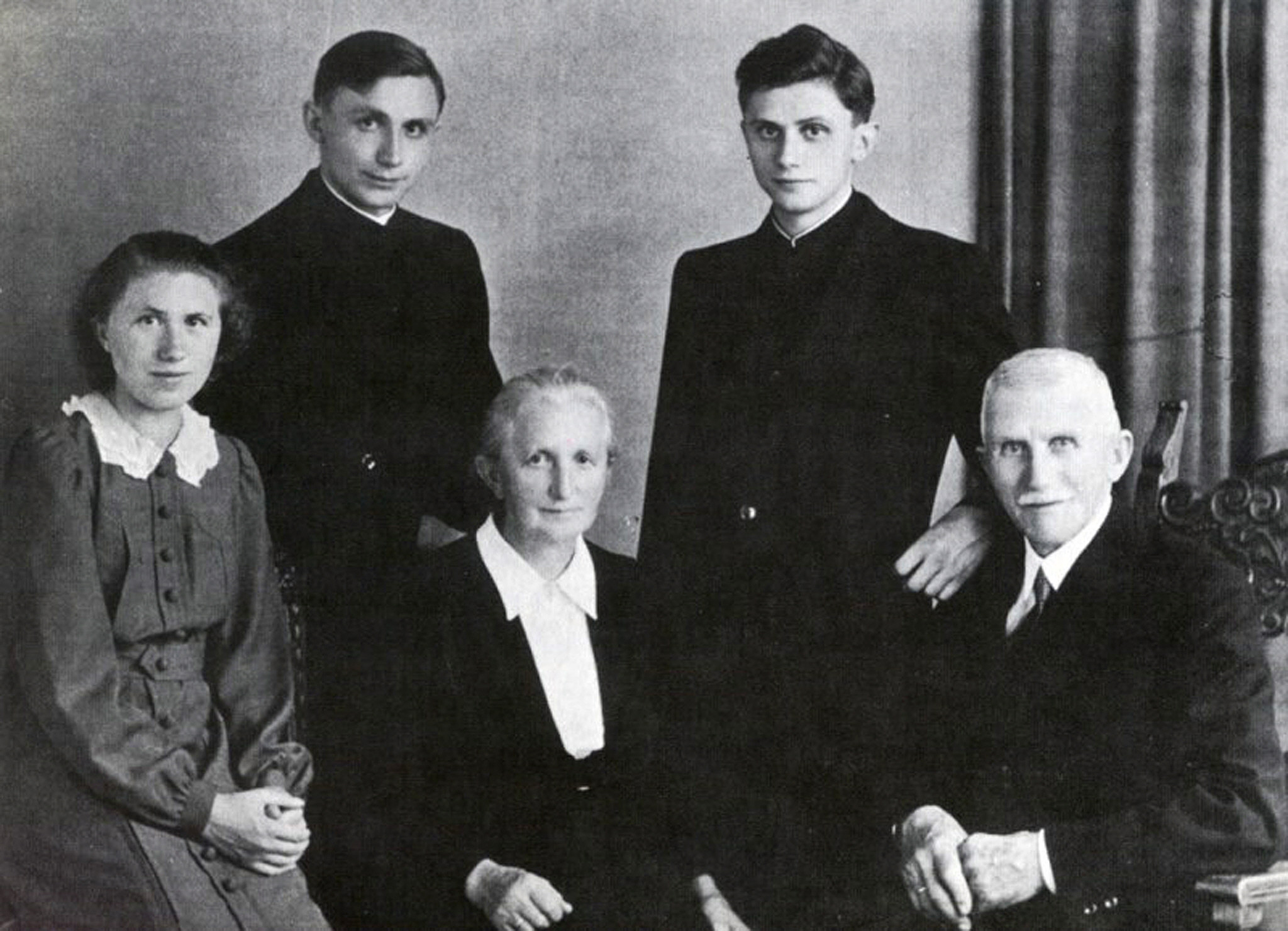 Picture taken in 1951 shows the family of Josef Ratzinger (up, R) in Freising, Bavaria, after the ordination of himself and his brother Georg (up L). Germany's Cardinal Joseph Ratzinger was elected the 265th pope of the Roman Catholic Church on 19 April 2005 and will take the name Benedict XVI, the Vatican announced. Bottom row : his sister Maria, his Mother Maria and his father Josef.