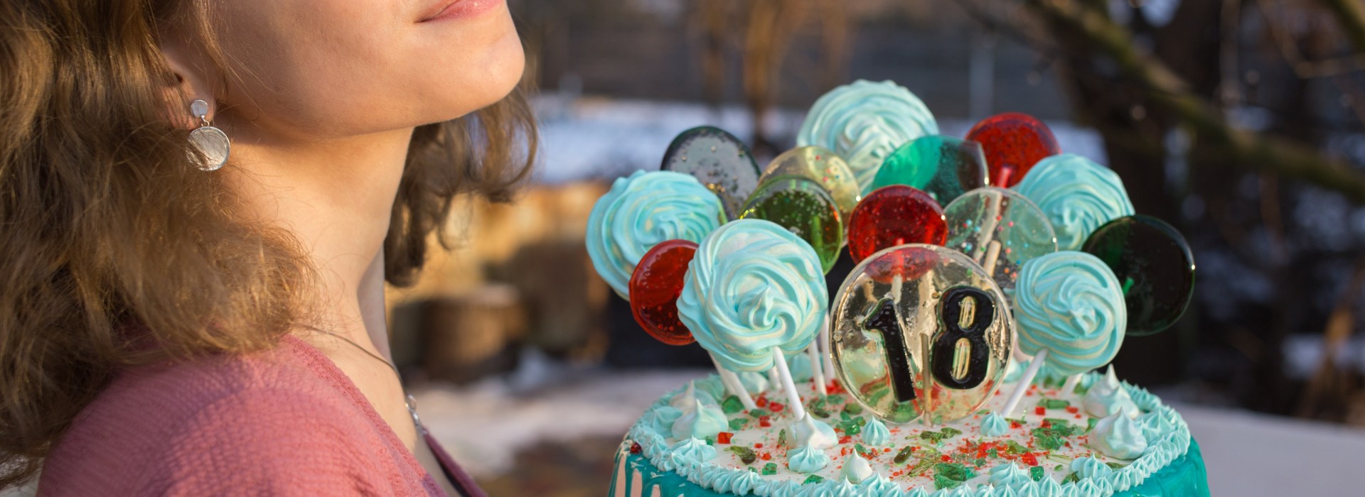 18 year old girl with birthday cake