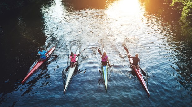 web-kayak-women-sunset-uber-images-shutterstock_318310229.jpg