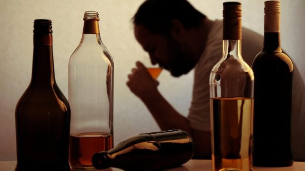 web-drinking-bottles-alcoholism- Axel Bueckert-shutterstock_284143052