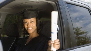 Poll-girl-graduate-driving-debt-blend-images-shutterstock