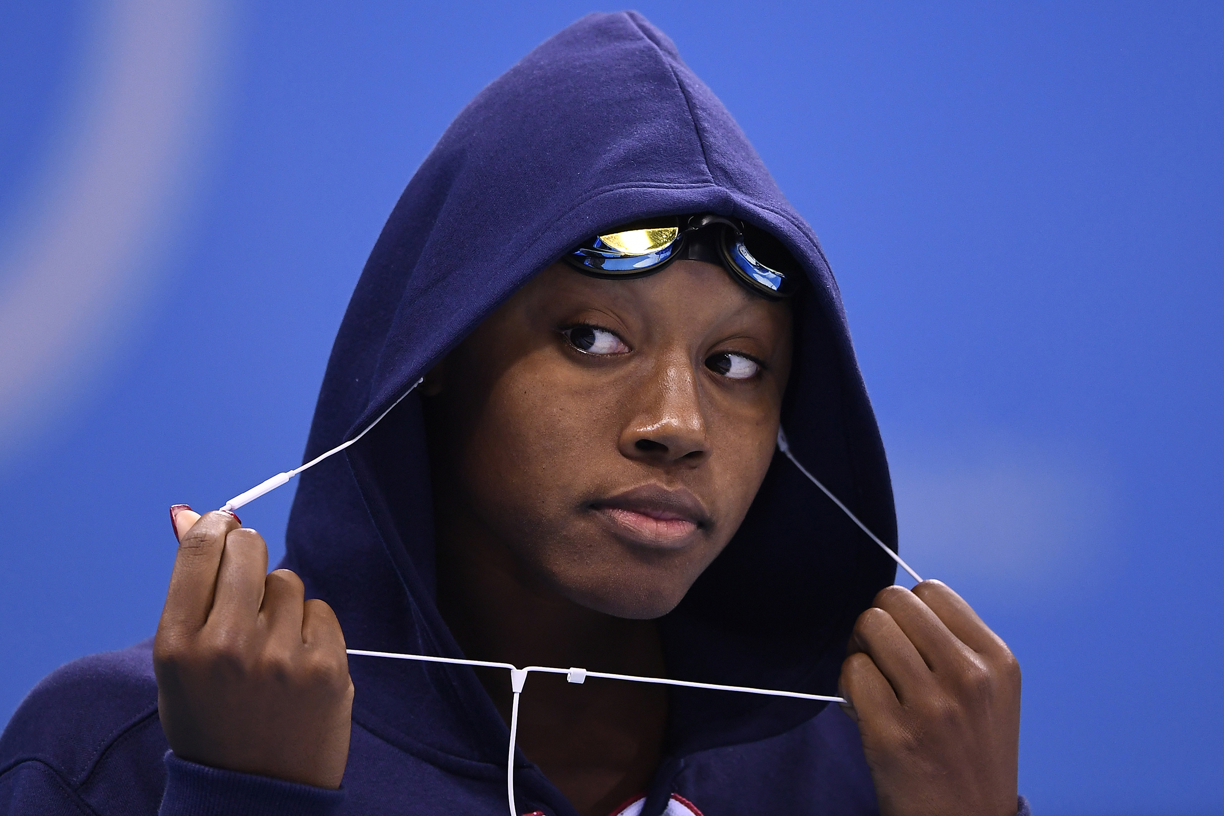 Simone Manuel takes part in the Women's 50m Freestyle Semifinal during the swimming event at the Rio 2016 Olympic Games at the Olympic Aquatics Stadium in Rio de Janeiro on August 12, 2016.   / AFP PHOTO / GABRIEL BOUYS