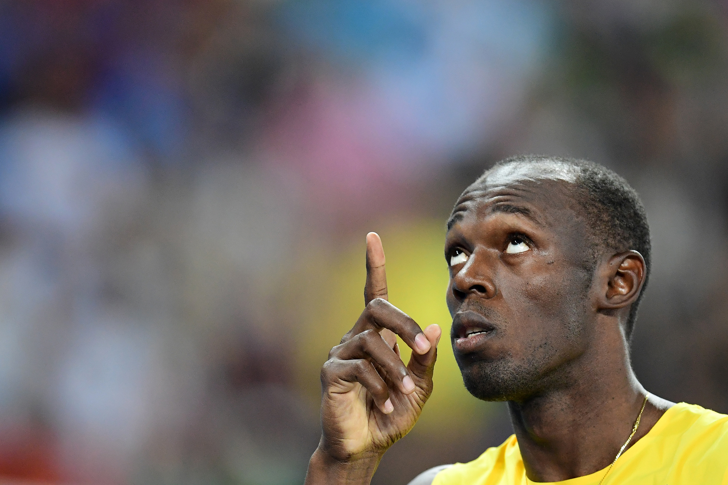 Jamaica's Usain Bolt gestures in the Men's 200m Semifinal during the athletics event at the Rio 2016 Olympic Games at the Olympic Stadium in Rio de Janeiro on August 17, 2016.   / AFP PHOTO / FRANCK FIFE