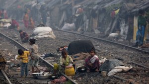 Slum Dwellers Live Near Railroad In India