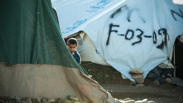 web-iraq-refugee-boy-tents-mustafa-khayat-cc