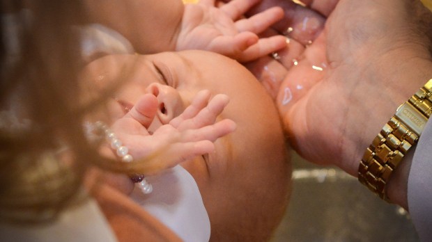 web-baptism-girl-hand-close-up-jeffrey-bruno