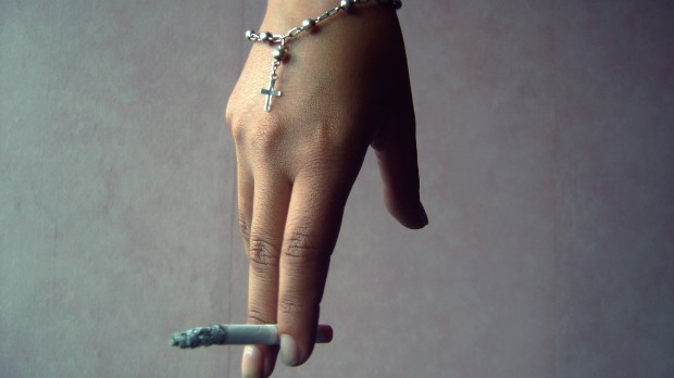 web-hand-cigarette-rosary-isolated-italo-gacitua-cc