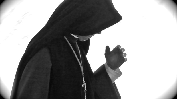 nun_deep_in_prayer