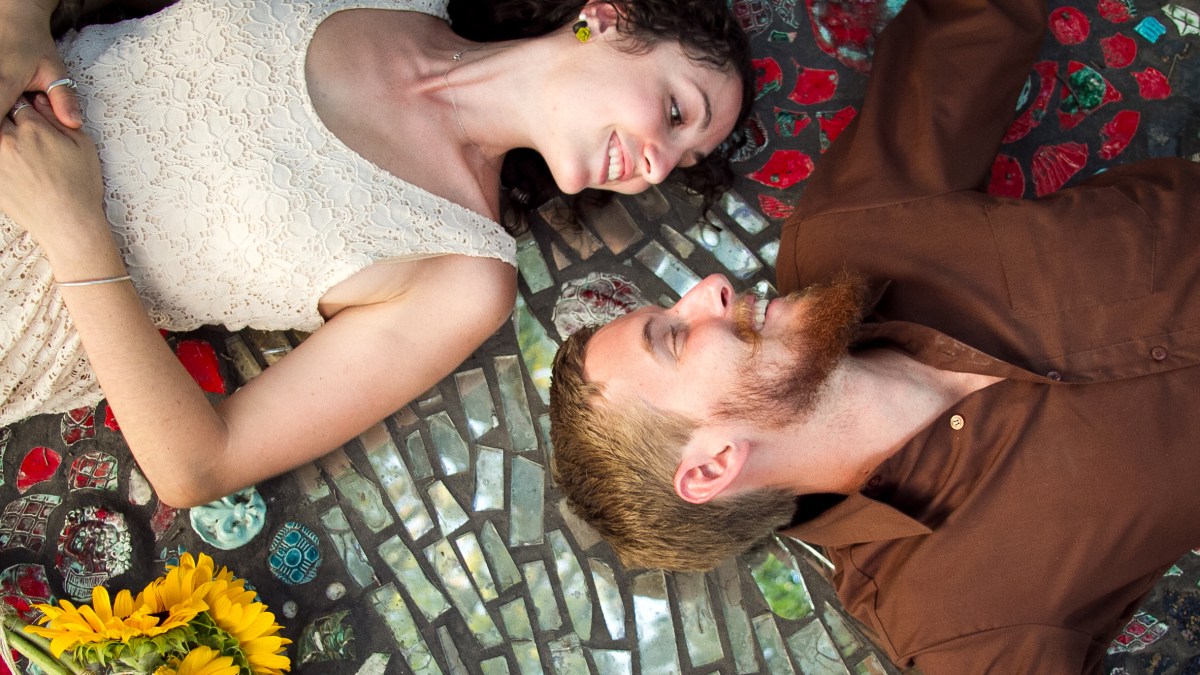 web-enagement-couple-flowers-laying-down-shelley-n-cc