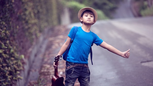 web-boy-musician-hitchhike-nachaphon-shutterstock