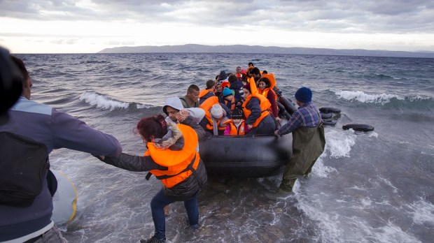 web-christian-refugees-lesbos-greece-syria-nicolas-economou-shutterstock_519491944