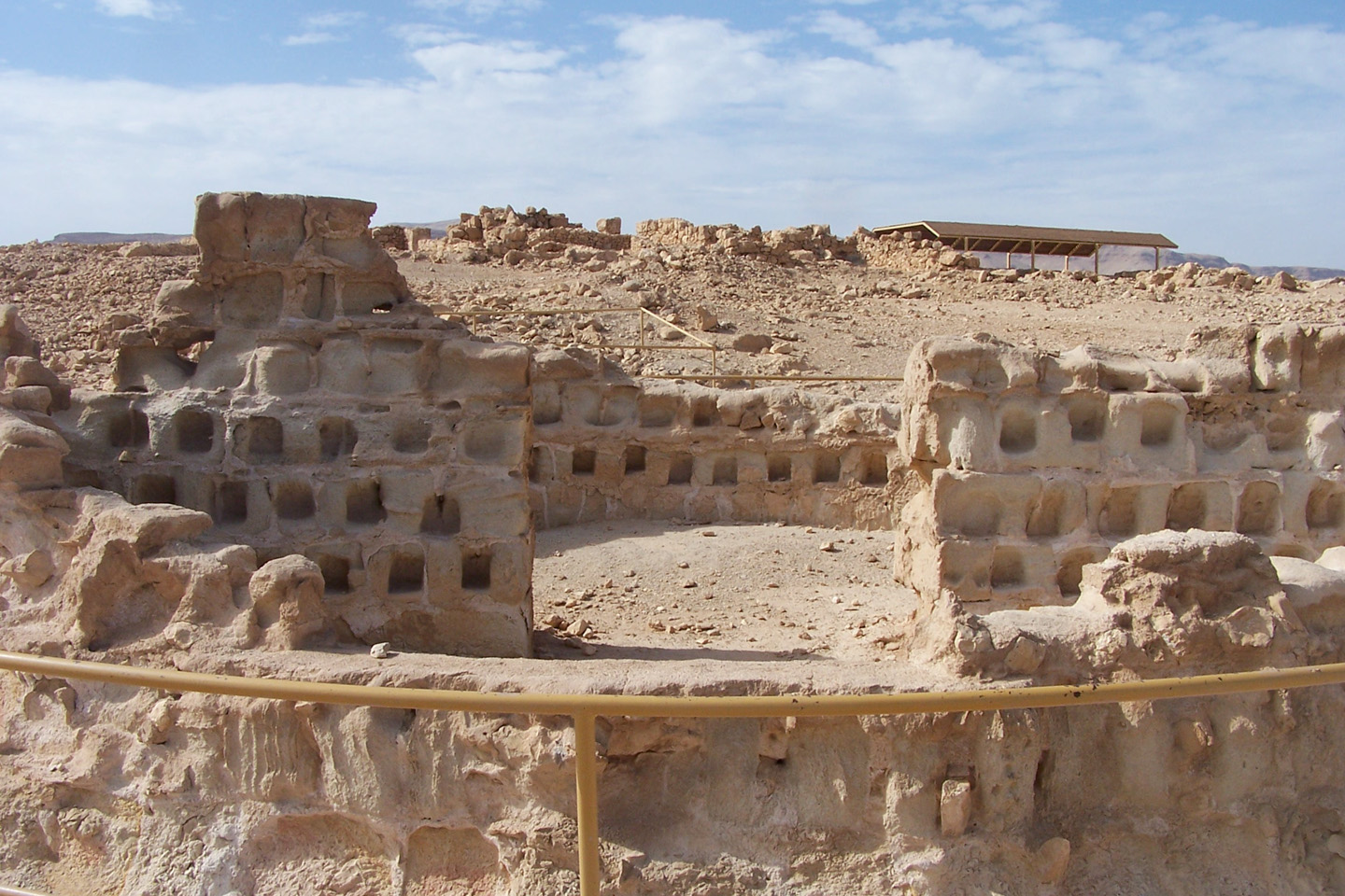 After the Romans destroyed the Second Temple, a group of Jewish rebels fled Jerusalem and settled themselves in Masada. Lucius Flavius Silva, who was then the Governor of Judaea, sieged the cliff for two or three months and eventually the Roman Tenth Legion was able to break through the walls and gates of the fortress and palaces of Masada in the year 73.