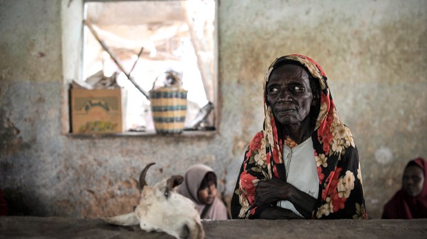 web-poverty-africa-old-woman-senior-goat-un-photo-tobin-jones-cc