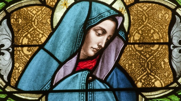 Stained glass window depicting the Blessed Virgin Mary as the Sorrowful Mother, or Dolorous Mother