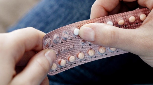 HERO WOMAN CONTRACEPTION PILL © Image Point Fr-Shutterstock
