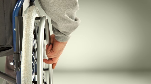WEB PERSON DISABLED WHEELCHAIR HAND © S_Photo &#8211; Shutterstock