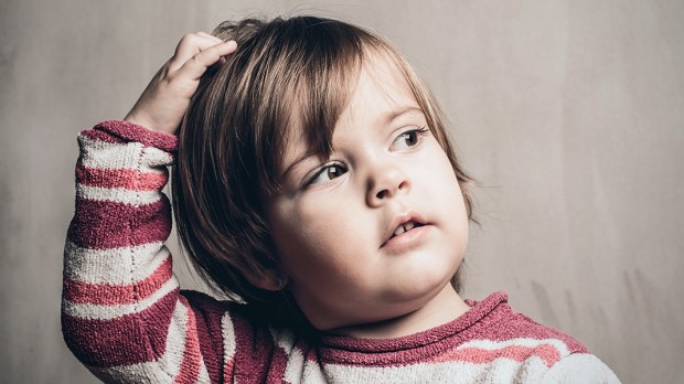 WEB3-CHILD-KID-SCRATCH-HEAD-LICE-STRIPES-ITCHY-Marko-Poplasen-Shutterstock