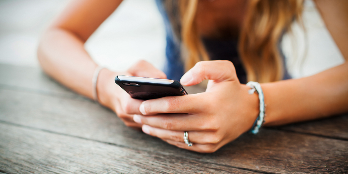 WEB3-GIRL-WOMAN-HANDS-PHONE-TEXTING-SOCIAL-MEDIA-shutterstock_387000259-Shutterstock