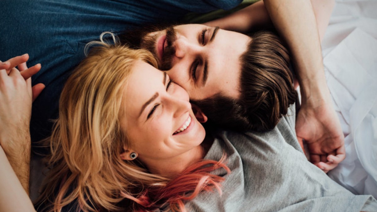 WEB3-LOVE-HUSBAND-WIFE-RELATIONSHIP-BED-SMILE-INTIMATE-Nemanja-Glumac-Stocksy