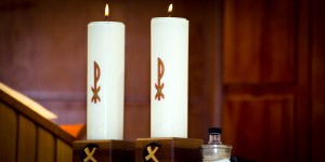 Why do Catholics use candles at Mass?