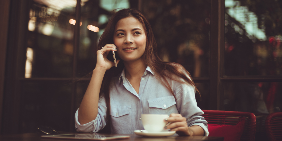 web3-woman-talking-phone-coffee-cafe-chevanon-photography-pexels