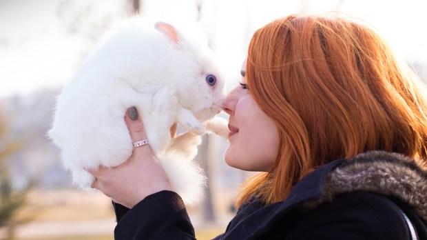 WEB3-BUNNY-RABBIT-WOMAN-KISS-NOSE-TOUCH-REDHEAD-ANIMAL-FRIENDLY-Shutterstock