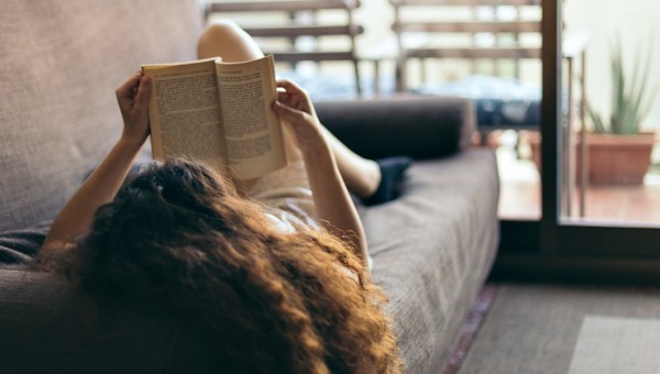 GIRL READING BOOK