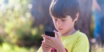 LITTLE BOY ON SMARTPHONE