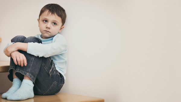SAD BOY ON STEPS