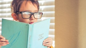 LITTLE GIRL READING