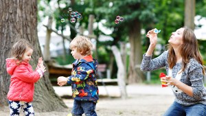 MOM BLOWING BUBBLES