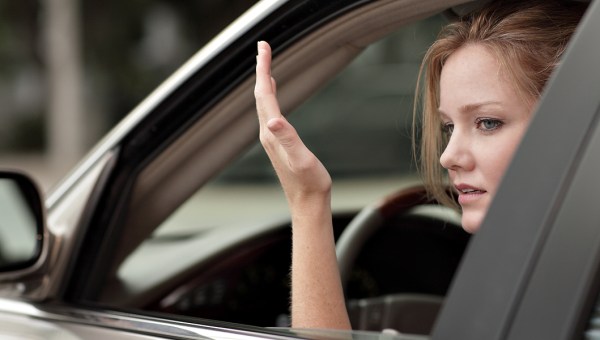WOMAN; CAR